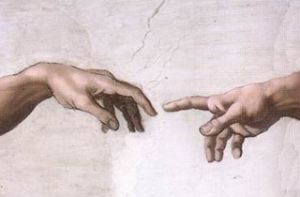 Picture of hands of God and Adam.